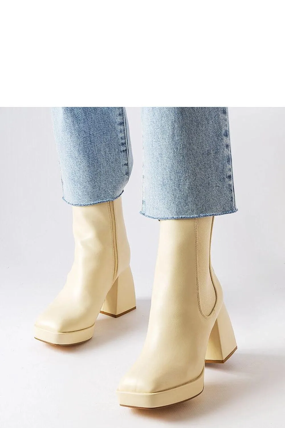 Beige ankle boots on a chunky heel