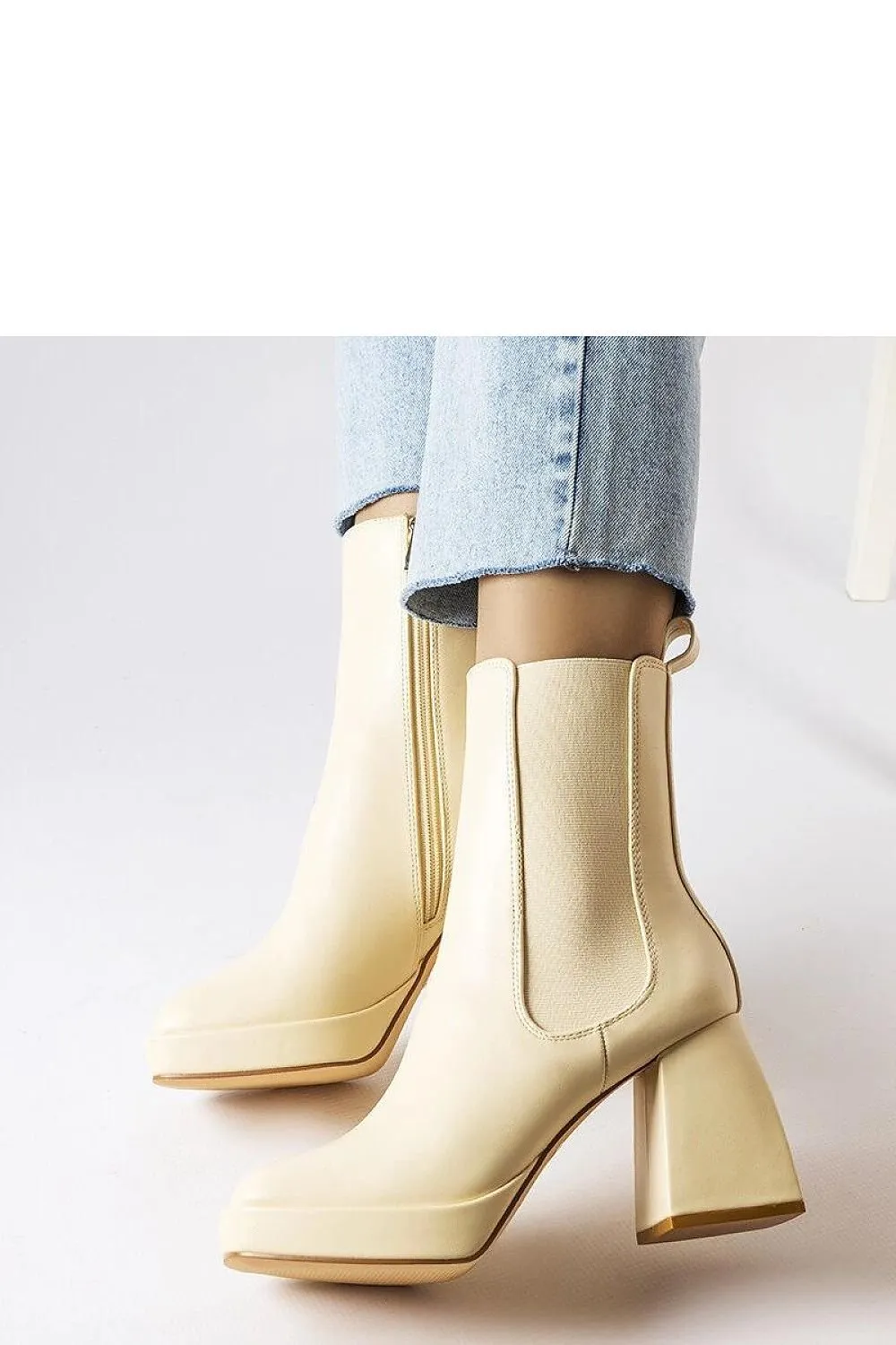 Beige ankle boots on a chunky heel
